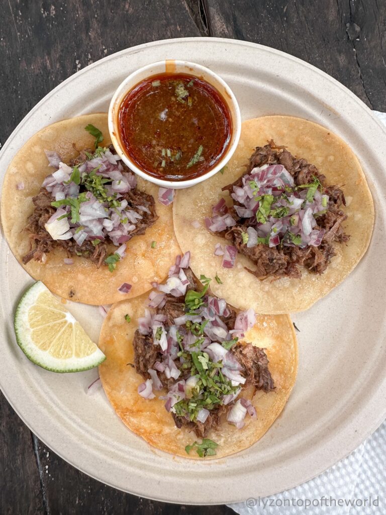 Soft open tacos on a paper plate from Taco Joint PH